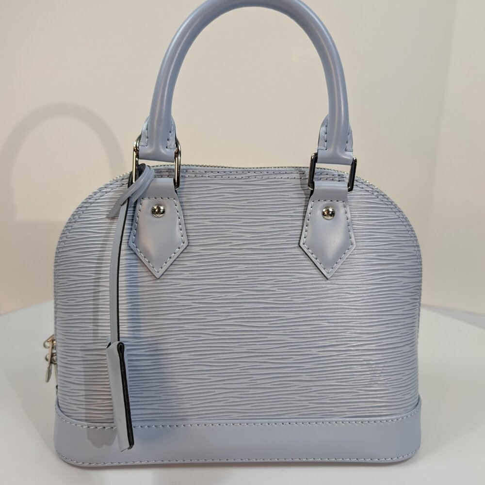 Louis Vuitton Alma BB Handbag in Blue Epi Leather with LV Strap - Picture 3 of 16